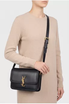Black leather bag with logo clasp
