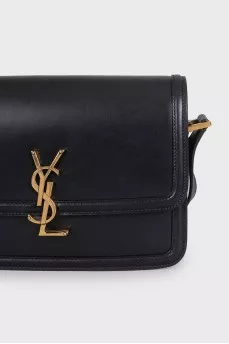 Black leather bag with logo clasp