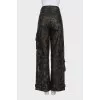 Wide-leg leather trousers with tag