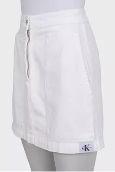 Denim skirt with a zipper and patch pockets