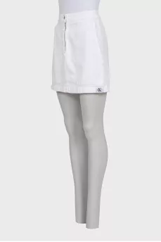 Denim skirt with a zipper and patch pockets