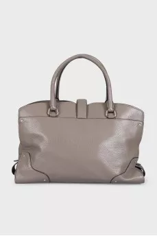 Gray leather tote bag with brand logo