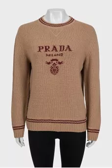 Brown straight-cut sweater with a brand logo