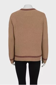 Brown straight-cut sweater with a brand logo