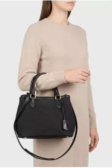 Black textile bag with a signature print