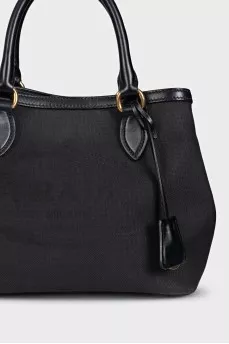 Black textile bag with a signature print