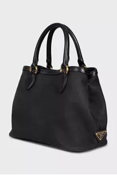 Black textile bag with a signature print