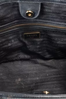 Black textile bag with a signature print