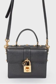 Black leather rectangular bag with a golden lock