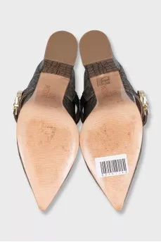 Leather shoes decorated with embossing with a bridge