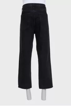 Men's black straight-leg jeans with buttons