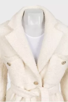 White cropped coat with decorated buttons