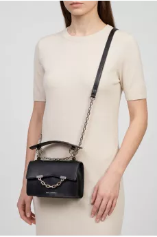Black leather bag with silver hardware