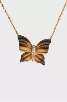Комплект из золота из серьг, кольца и подвески