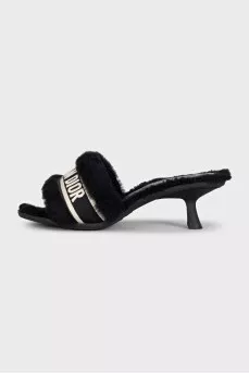 Mules with heels decorated with fur