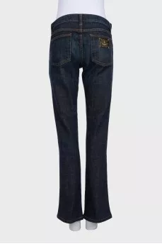 Джинси кльош синього кольору на середній посадці