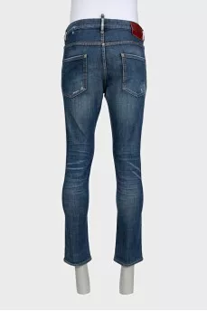 Men's mid-rise jeans with a ripped effect