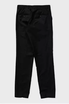 Men's straight black trousers with creases
