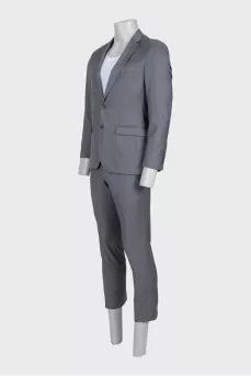 Men's suit with straight trousers made of gray wool