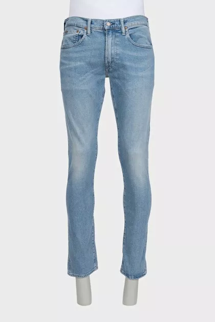 Men's light blue straight fit jeans with a button