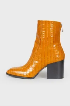 Leather square toe booties with a tag