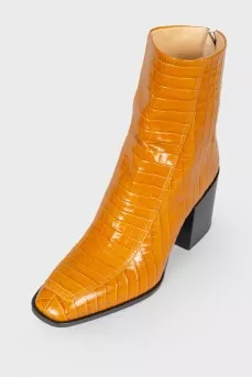 Leather square toe booties with a tag