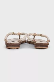 Beige leather flip-flops with a print