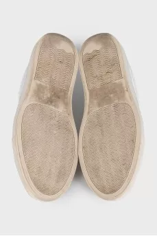 White leather lace-up sneakers