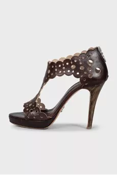 Brown leather sandals with perforations