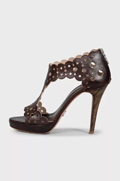 Brown leather sandals with perforations