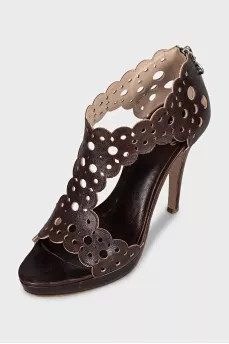 Brown leather sandals with perforations