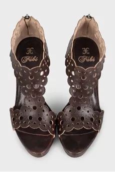 Brown leather sandals with perforations