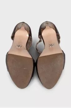 Brown leather sandals with perforations