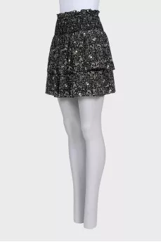 Black fitted skirt with a print