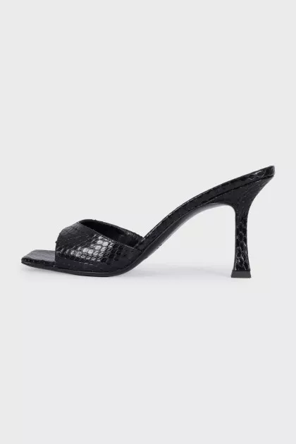 Black snakeskin heeled mules