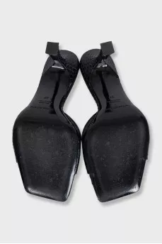 Black snakeskin heeled mules