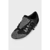 Black leather sneakers with decor