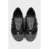 Black leather sneakers with decor