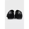 Black leather sneakers with decor
