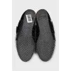 Black leather sneakers with decor
