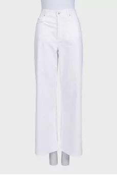 White jeans with leather jacron