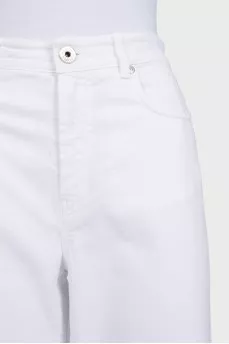 White jeans with leather jacron