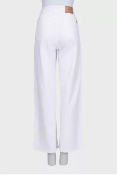 White jeans with leather jacron