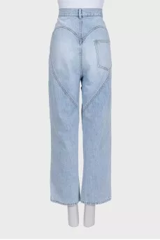 Light blue wide-leg jeans with slits and decoration