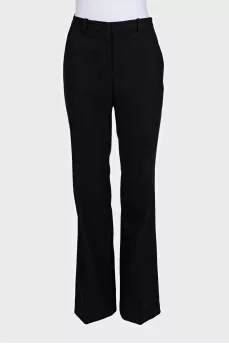 Black high-waisted wide-leg trousers with creases