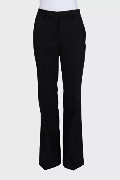Black high-waisted wide-leg trousers with creases