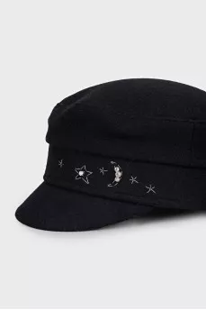 Black wool cap with decoration