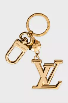 Gold-colored keychain for a bag