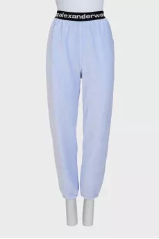 Blue tracksuit with black elastic waistbands with logo