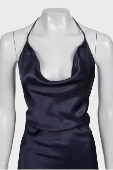 Fitted dress with ties and an open back